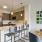 open kitchen counter seating next to dining area