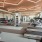spacious fitness center with ample lighting throughout