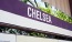 "Chelsea" sign along top of building